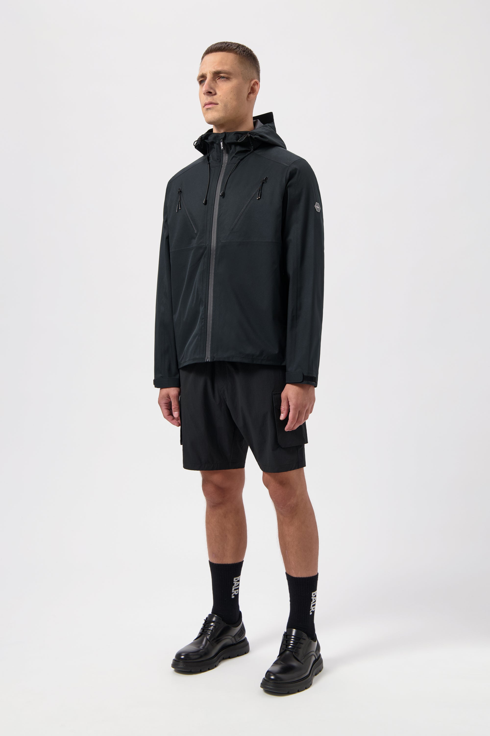 Hex Chaqueta para lluvia de insignia Jet Black