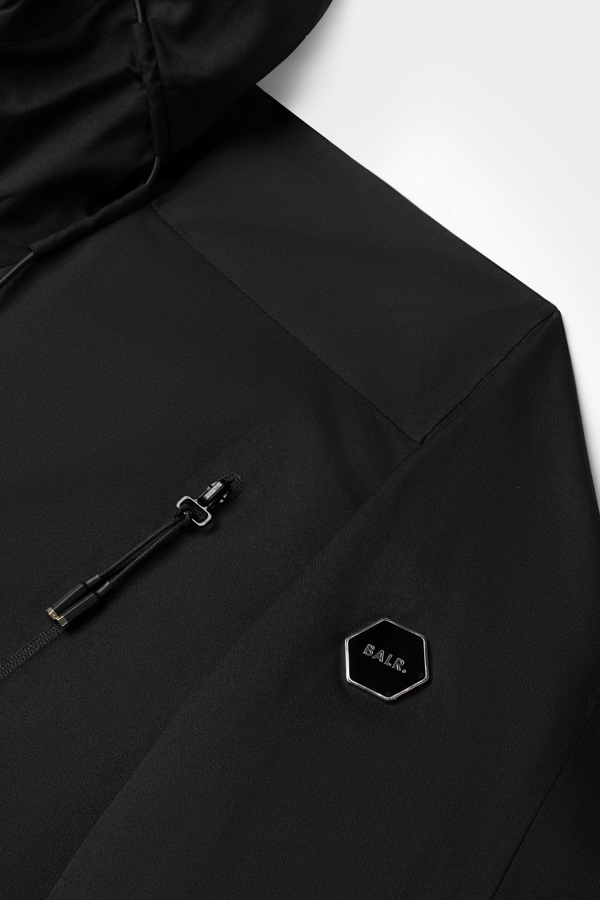 Hex Chaqueta para lluvia de insignia Jet Black