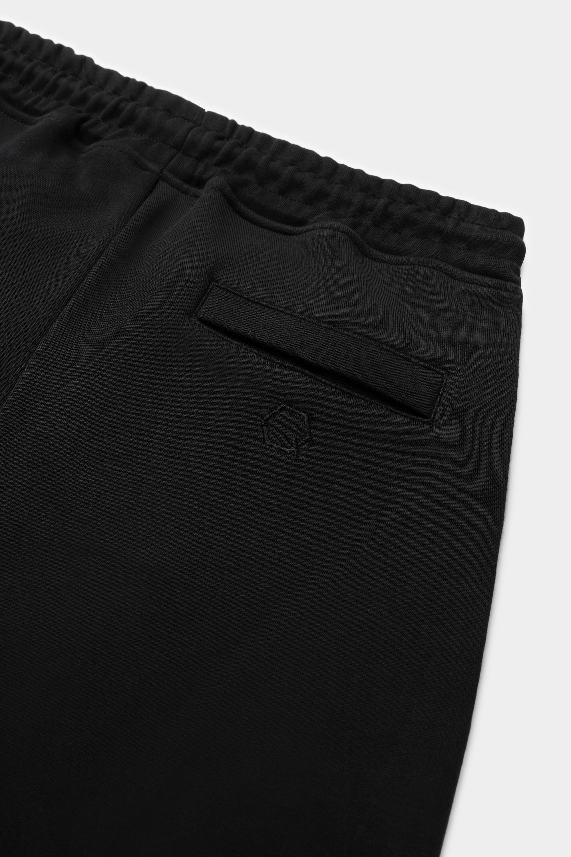 Regular de la serie Q Fit Persona que practica jogging Jet Black
