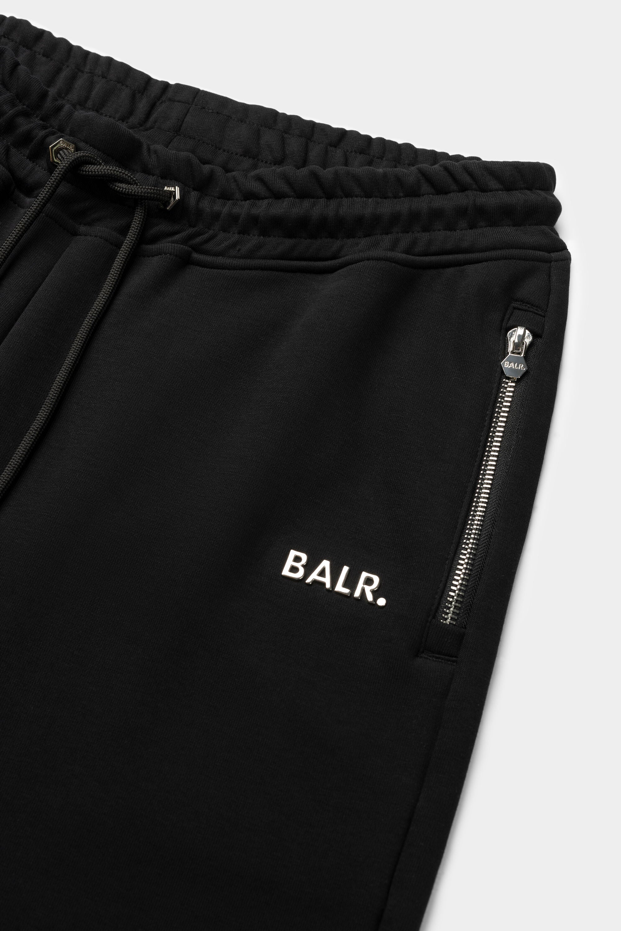 Regular de la serie Q Fit Persona que practica jogging Jet Black