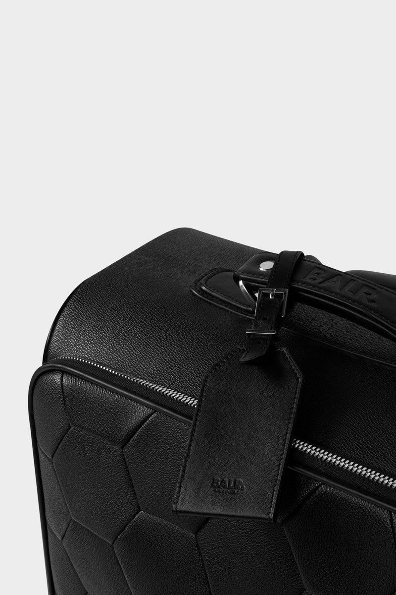Tag à bagages en cuir noir